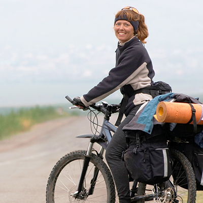 Woman_on_touring_bike_www.yha.co.nz.jpg